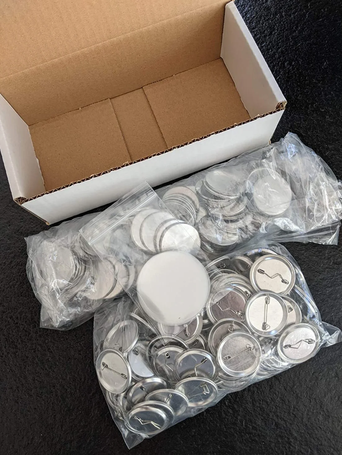 500 Consumibles para chapas de 31 mm, recambios con alfiler y plástico protector para máquinas F150, F300, B500, B700