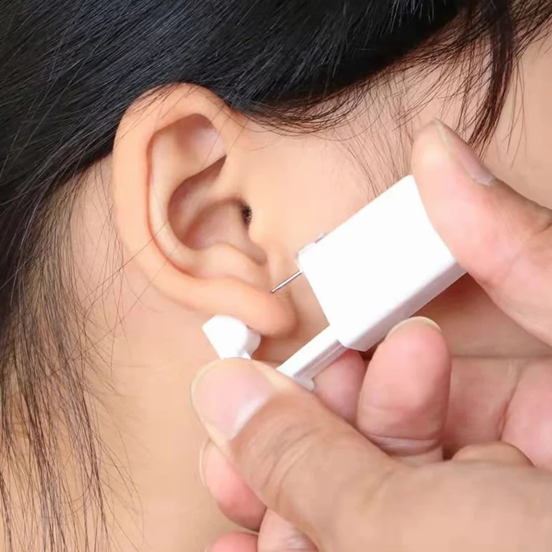 Pistolas Desechables para Piercing de Oreja Blanco Kit de Perforación sin Dolor Portátil