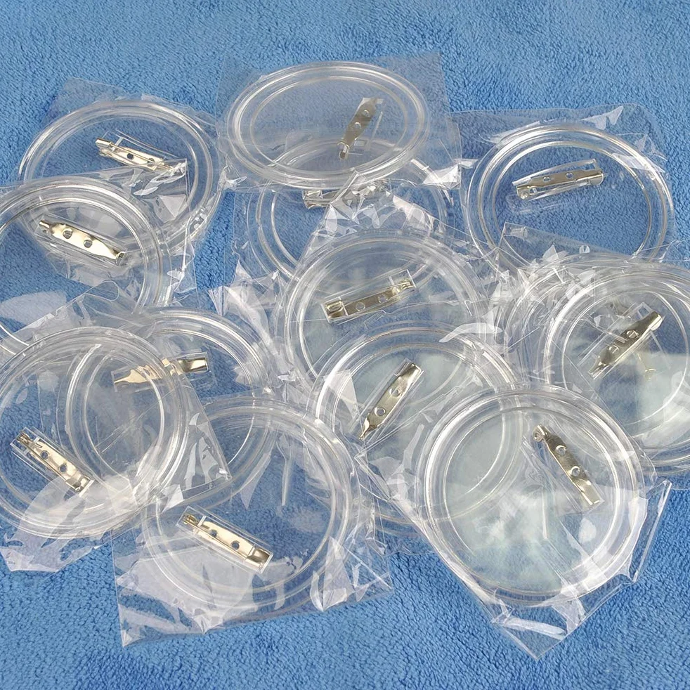 BUYGOO 50 Piezas Chapas Plásticas con Alfiler Incluido, Botón de Pin Redondo de Acrílico Transparente