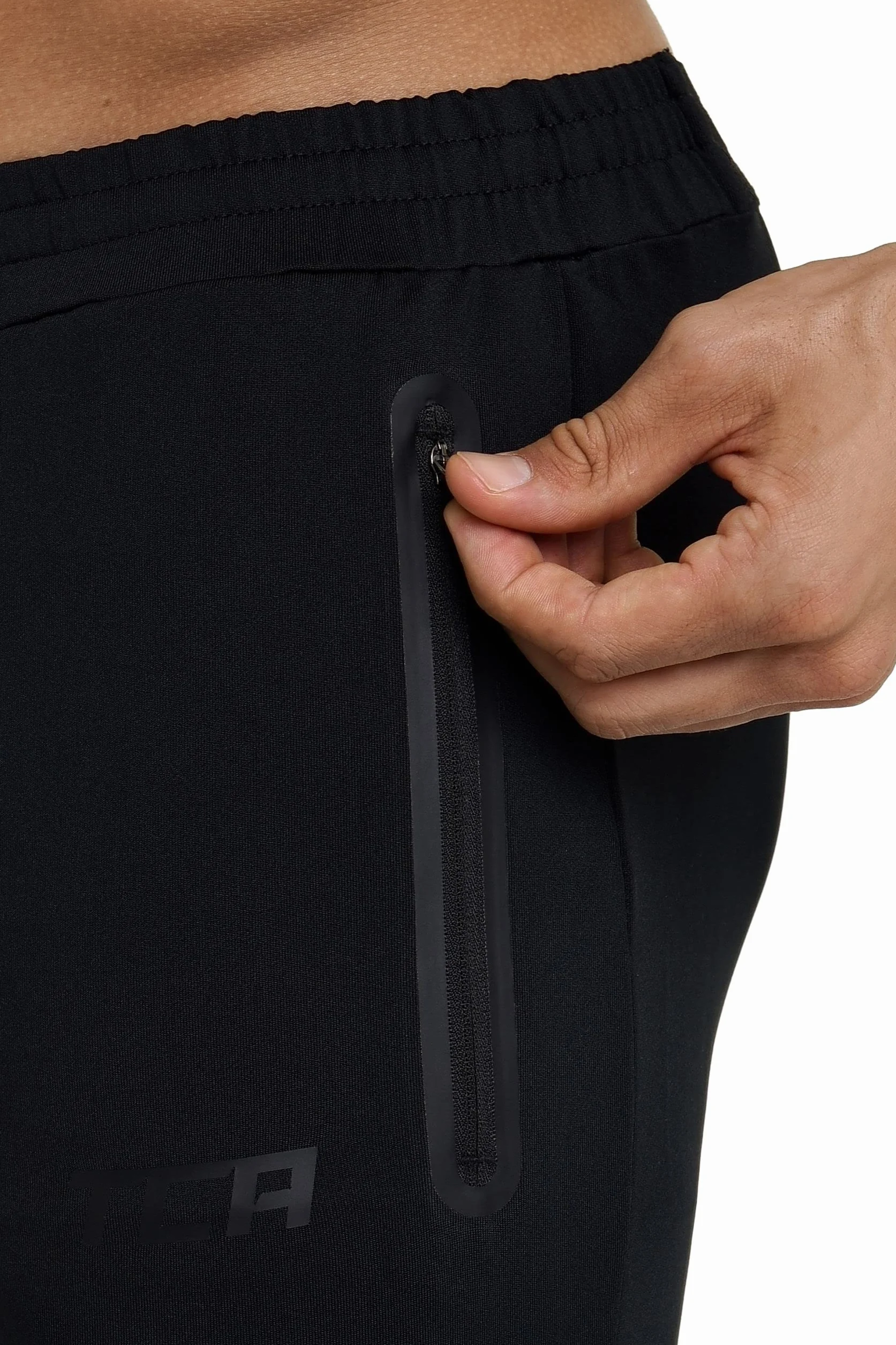 TCA Hombre Rapid Pantalon con Bolsillos con Cremallera Chandal Pistero